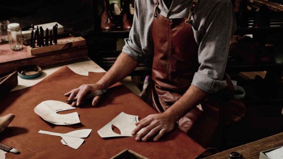 LAEZ artisan cutting leather by hand